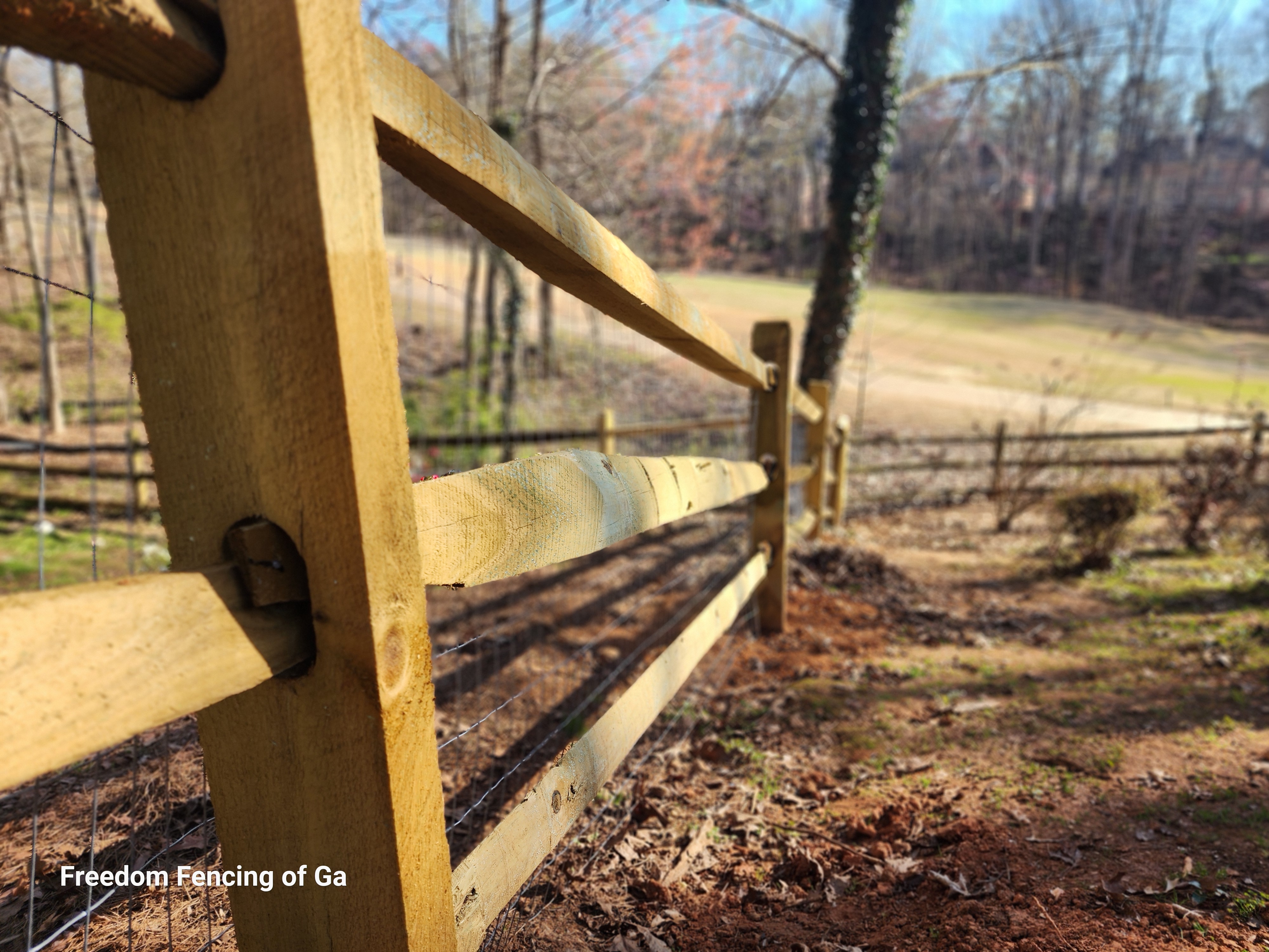 Three rail split rail fence in Woodstock Georgia