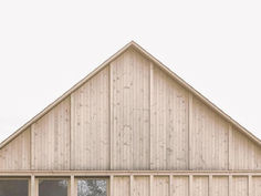 Maison avec revêtement extérieur de bois