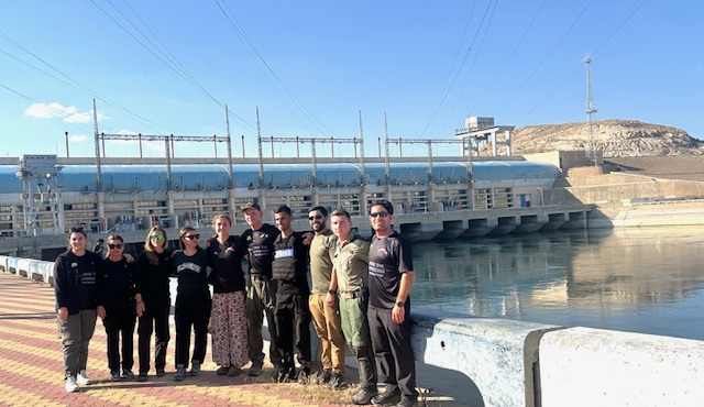 FBR team in front of Tishreen Dam.