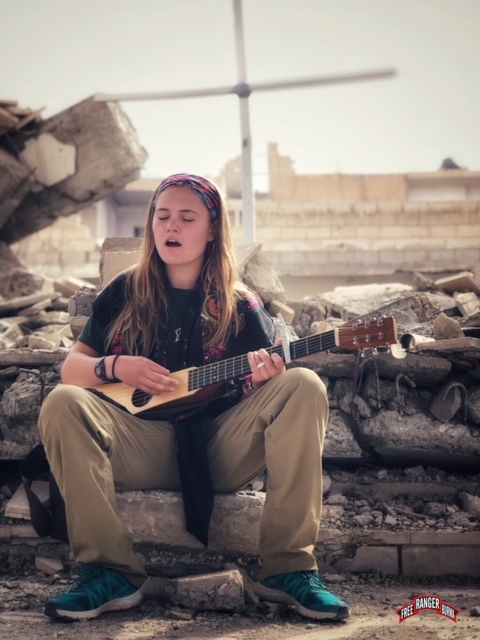 Sahale sings in the ruins of the church