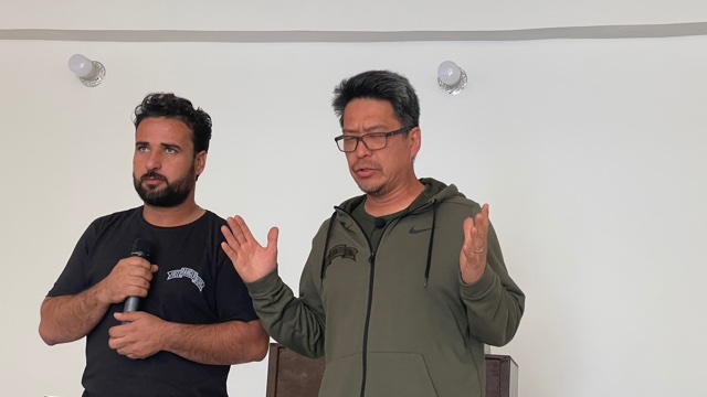 Pastor Tae from Grace Church in Maryland prays at the dedication