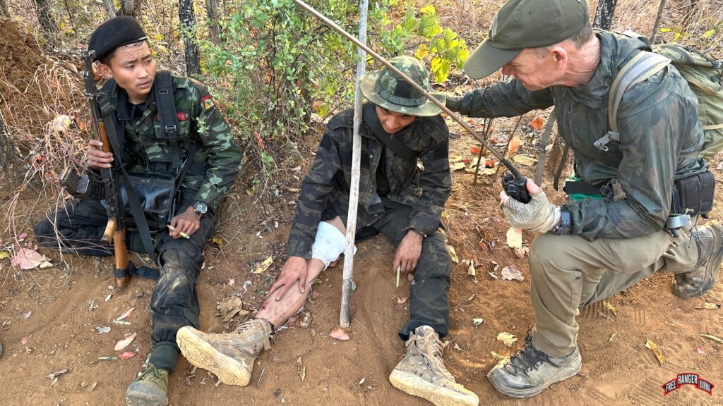 Praying with the wounded.