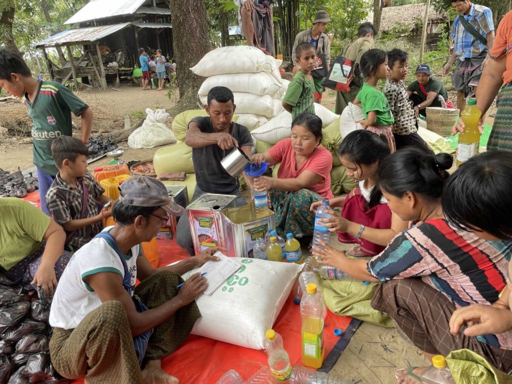 FBR teams and local leaders distribute food to IDPs.