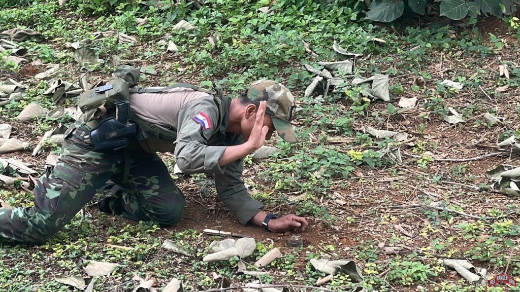 FBR team member clearing more Burma Army landmines.
