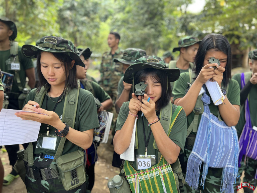 Students practicing land navigation. 