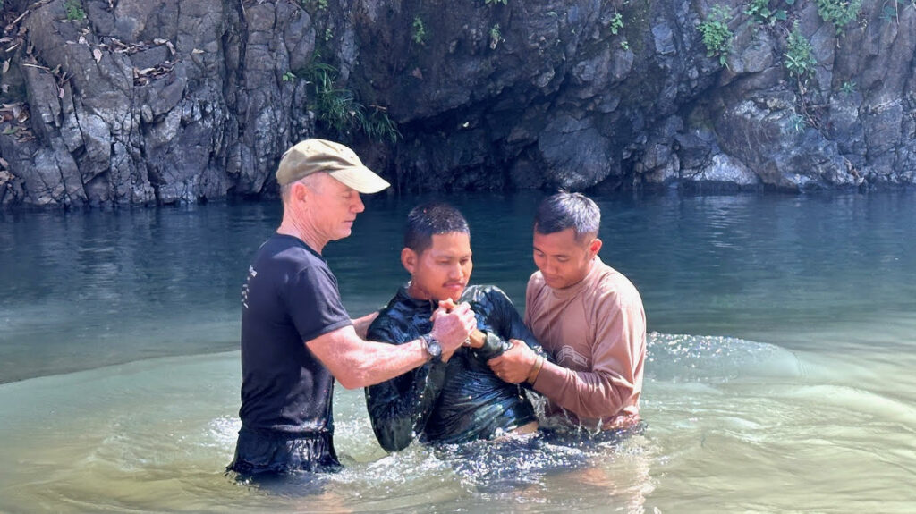 Poe Aung is baptized at camp.