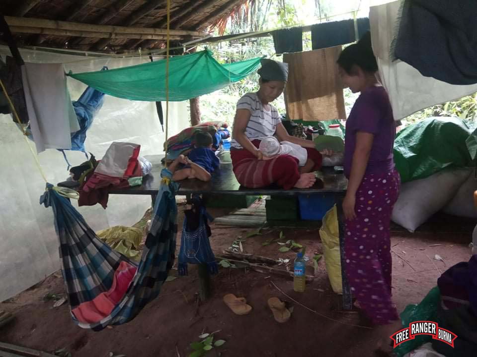 Woman with a child in hiding