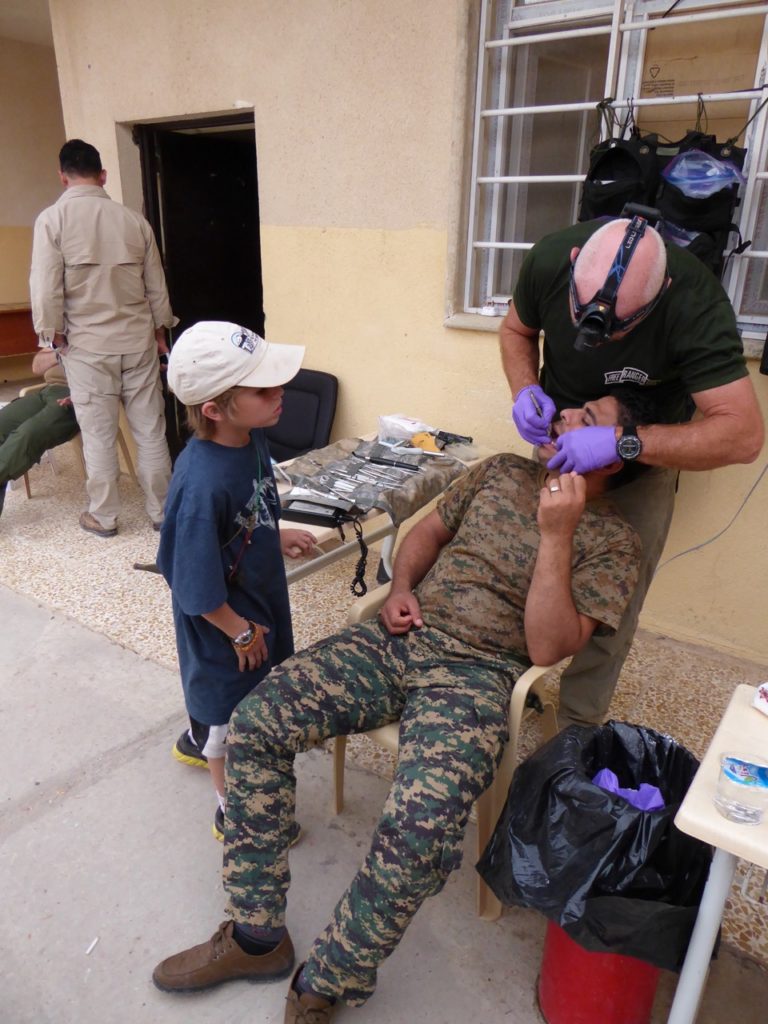 Dr. Shannon fills teeth