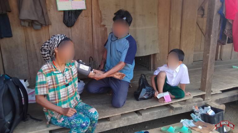 FBR team providing medical care to villagers.