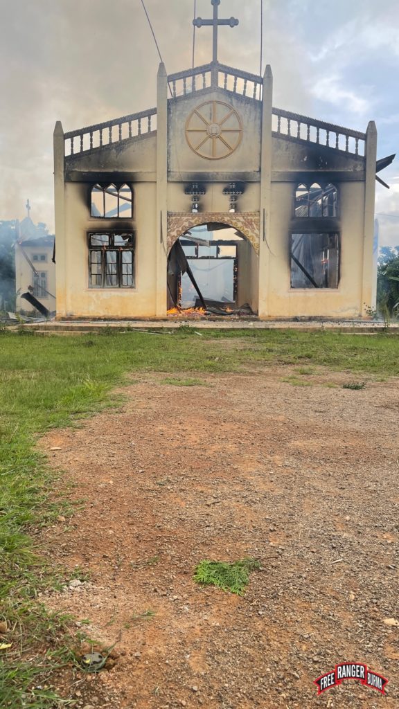 Burma Army landmine at bottom left of this photo of the burning church