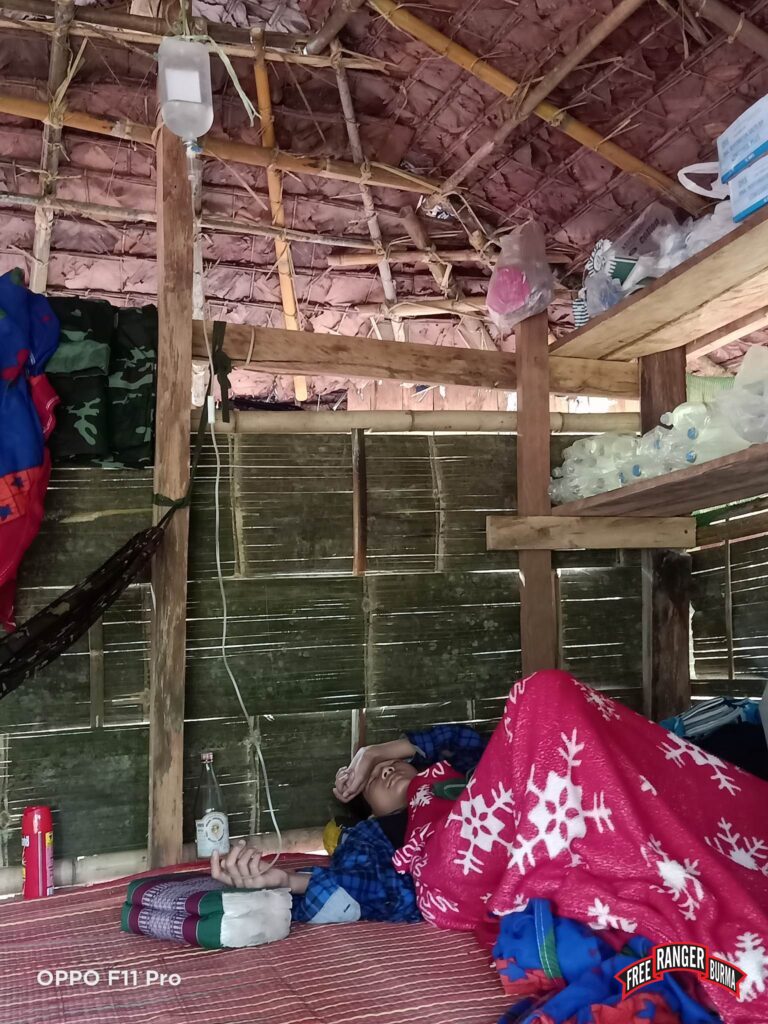 IDP villager being treated in the new clinic.