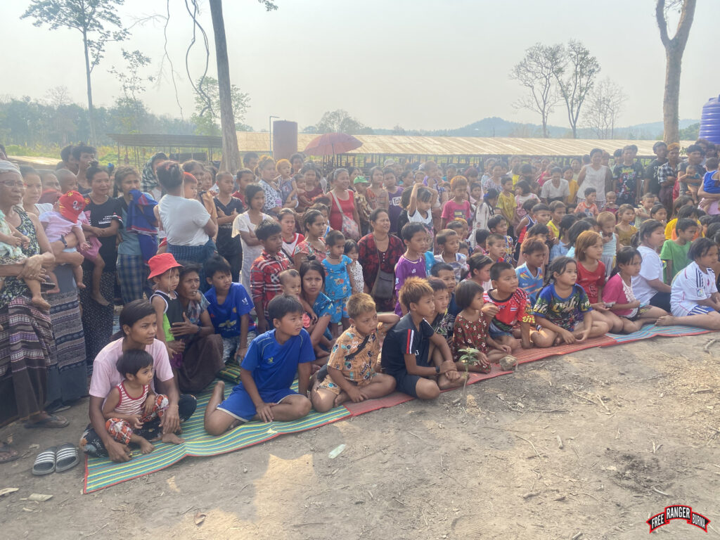 Refugees gather for a GLC program.