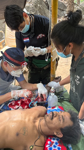 Surgery to save an enemy life.