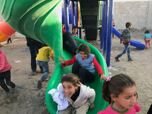 Life and Faith in the Face of New Attacks: A Playground and Church in Kobani, Syria