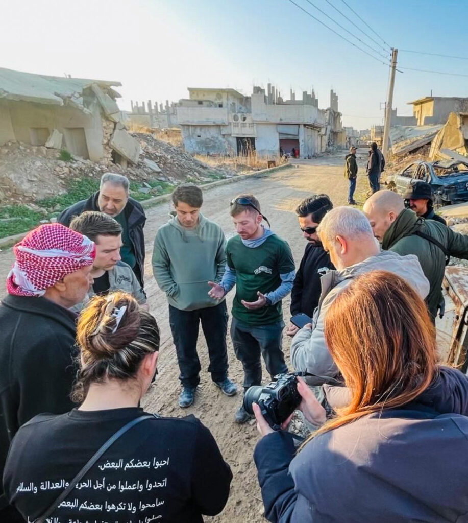 The FBR team prays with people they met.