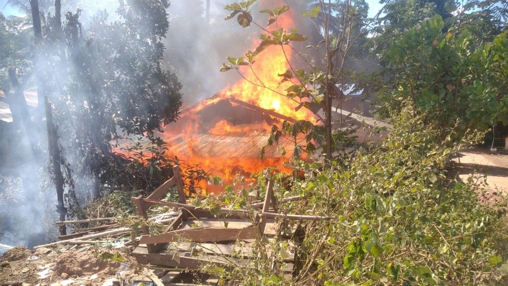 Burma Army soldiers burn homes in Pa Den Gow Village.