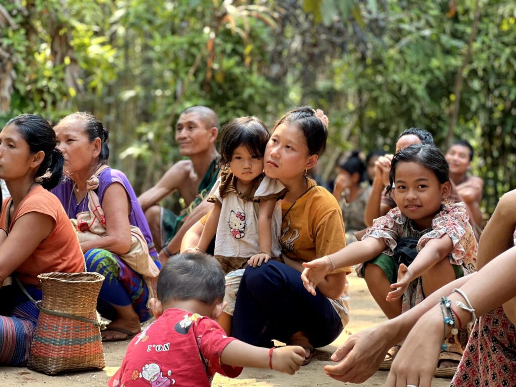 IDPs watching a GLC program.