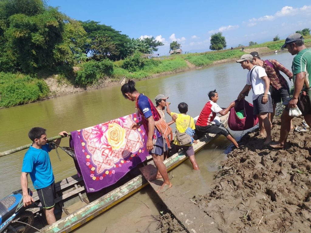 FBR teams and locals transport young mother and child to a safe location.