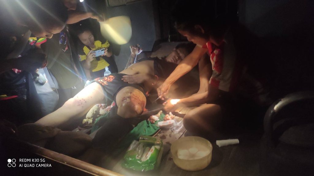 FBR medics working on injured villager from Burma Army mortar attack on Zaw Wei Village.