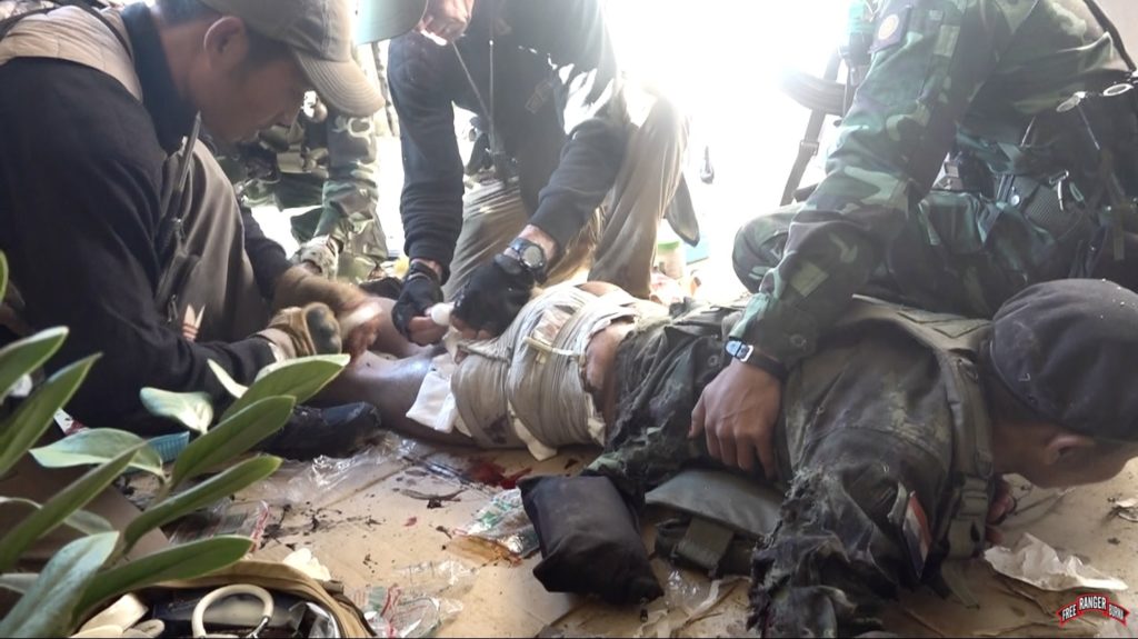 FBR medic Joseph and Dave Eubank treating Francis on 10 February in Demoso, Karenni State.
