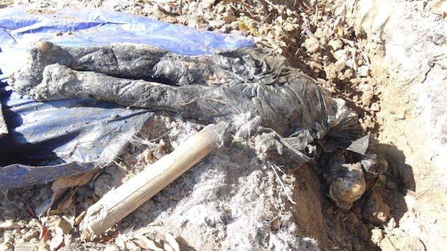Body of one of the villagers tortured to death by Burma Army in Nam Lim Pa.