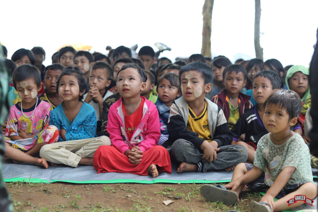IDP children listen as Rangers share at GLC program.
