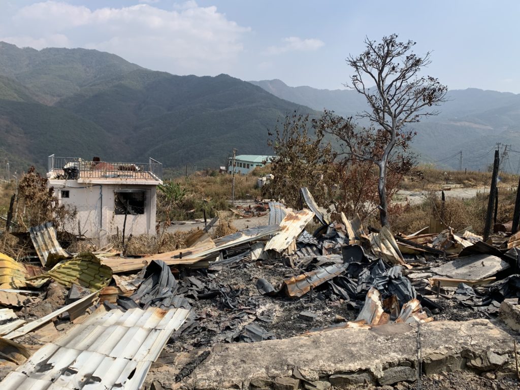 Homes destroyed by the Burma Army in the town of Thantlang.