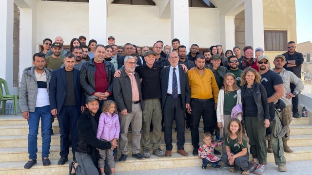 Raqqa Civil Council, Armenian Christians, and our team on the front steps of the new church after dedication
