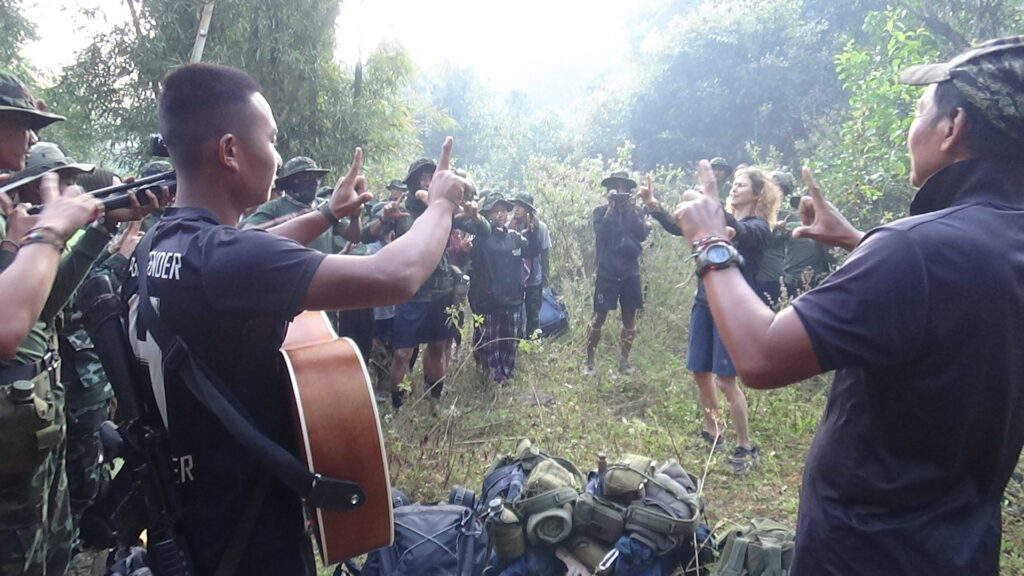 Rangers encourage each other with L-O-V-E song before starting the day.