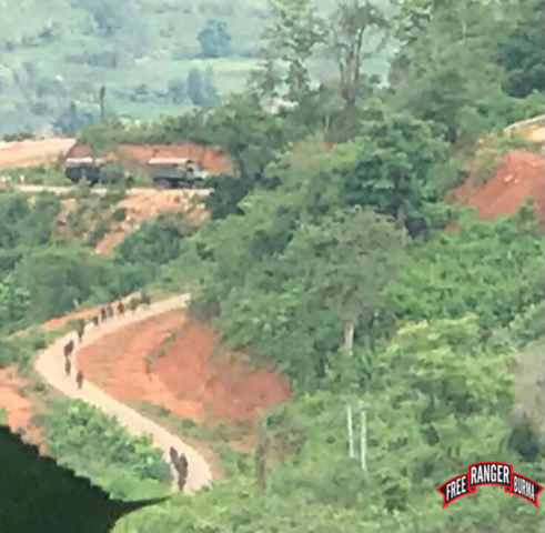 Burma Army soldiers on the move, 30 June, from Loikaw to Shawdaw, Karenni State.