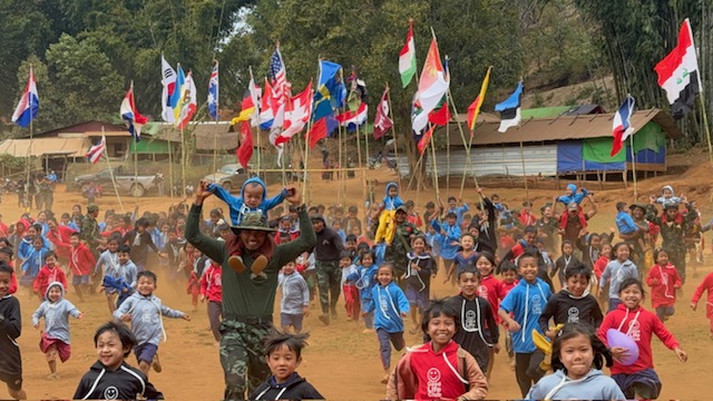 The kids "charge" to end a GLC program.