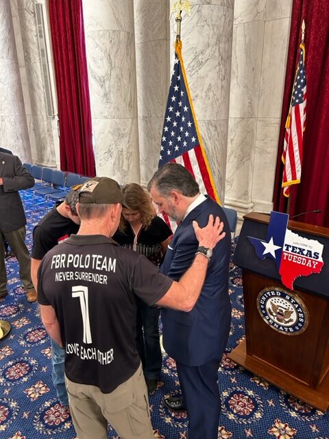 Praying with Senator Cruz.