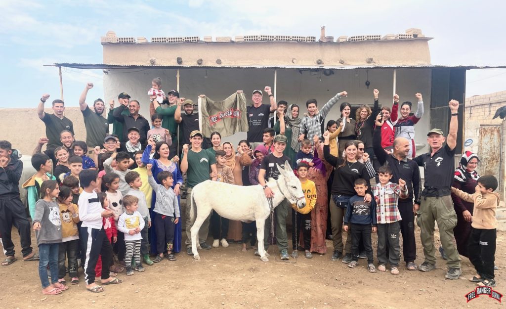 With the donkey Snowflake we rescued from Isis attack in 2019 and the family that took her in.