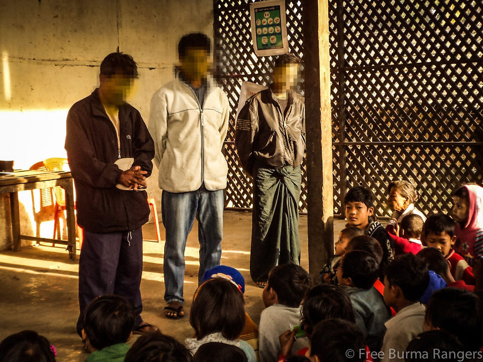 Rangers praying with Arakan IDPs