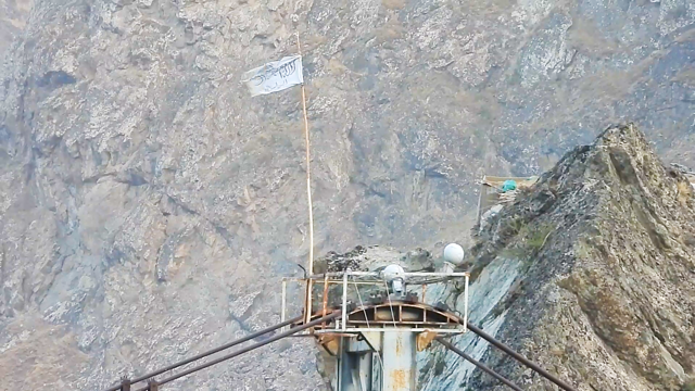 Taliban flag on border bridge over the Panjshir River between Qalai Khumb and Sherkan