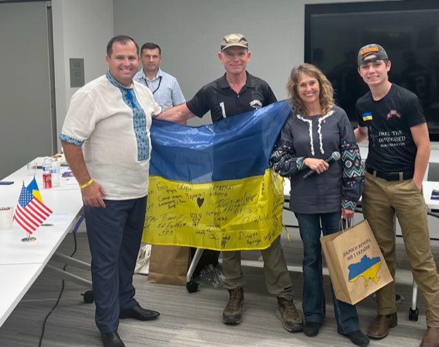 Pavel, Ukrainian leader, presents flag to FBR.