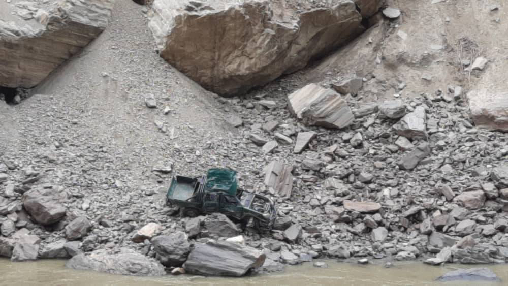 Former Afghan government vehicle destroyed by the Taliban and abandoned at the river along the border.