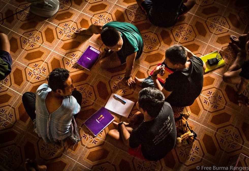 Rangers practice negotiation skills during a breakout session.