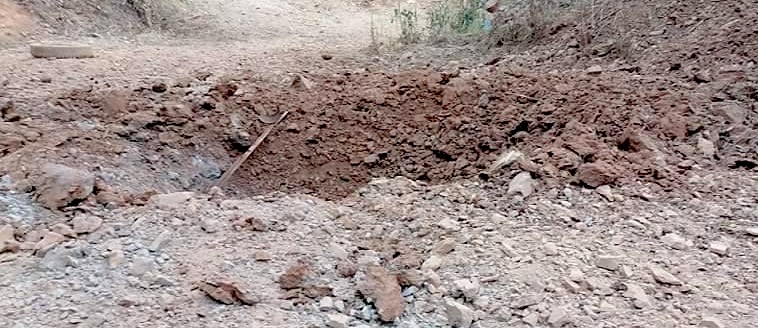 Bomb crater at Shwe Naing Bin