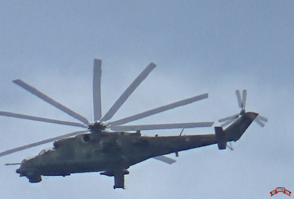 Burma Air Force attack helicopter flying over Thaton District, south of Papun District