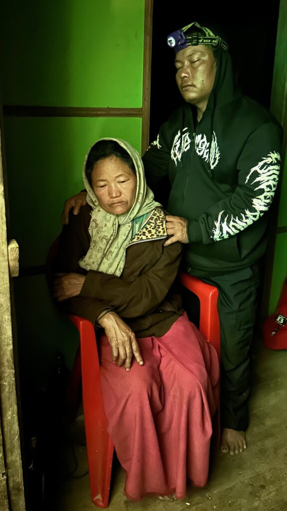 Praying with his family.