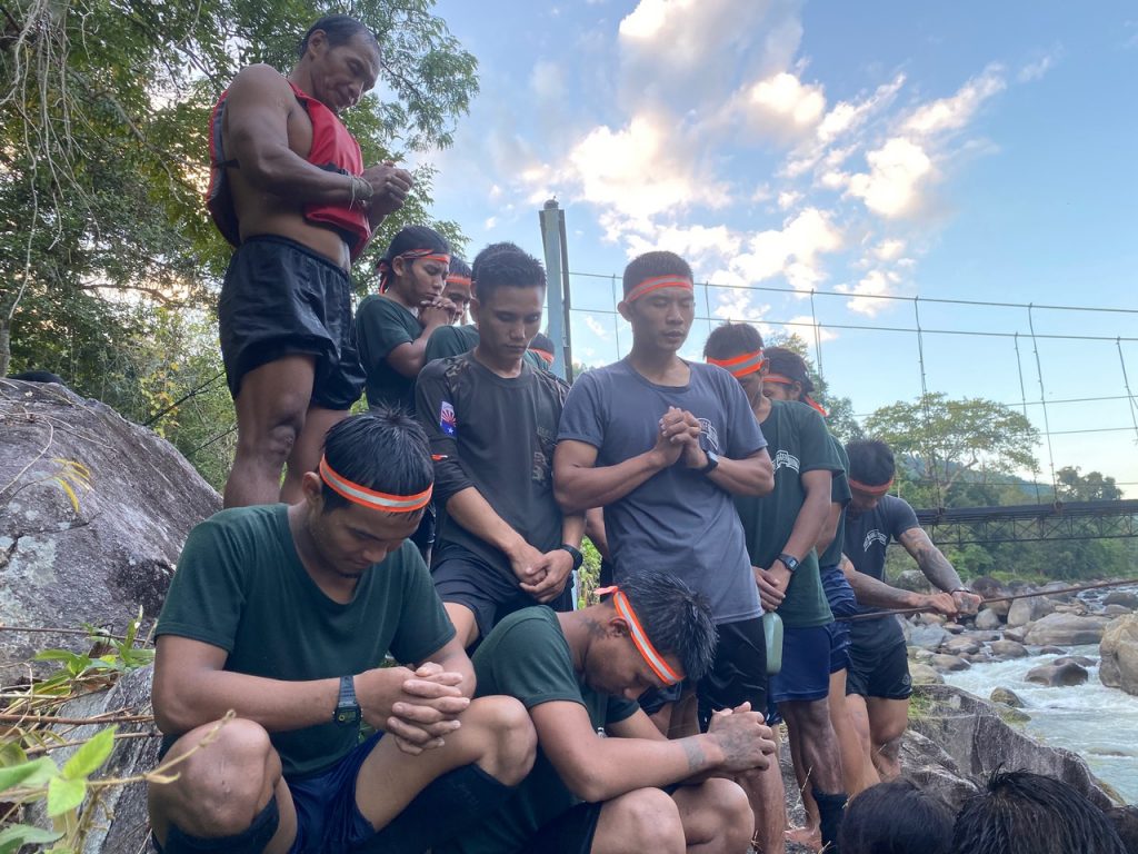 Praying before swim training