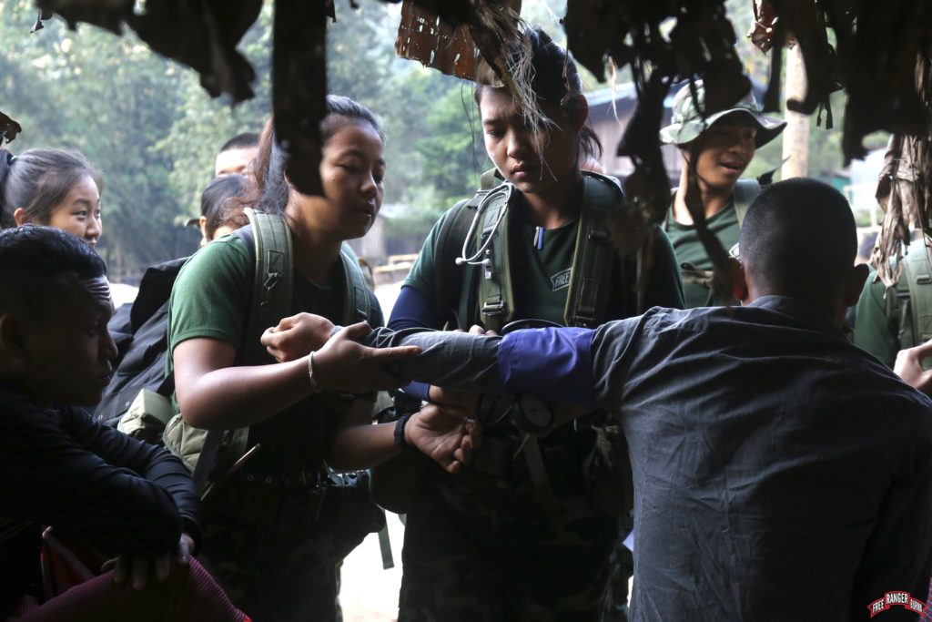 Students practicing medical care during their final exercise.