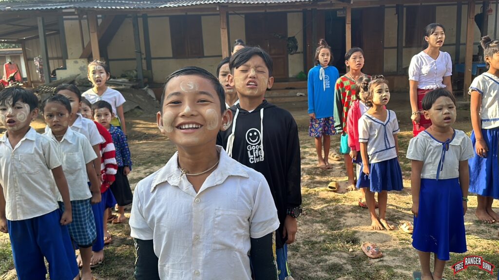 School children singing the Karen national anthem.