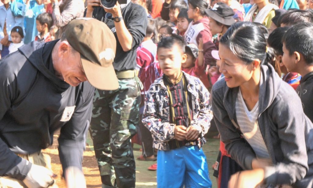 Sulianna, sister of the murdered brothers, dances with joy.