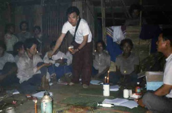 Kyar Shell giving medicine to IDPs while on a mission