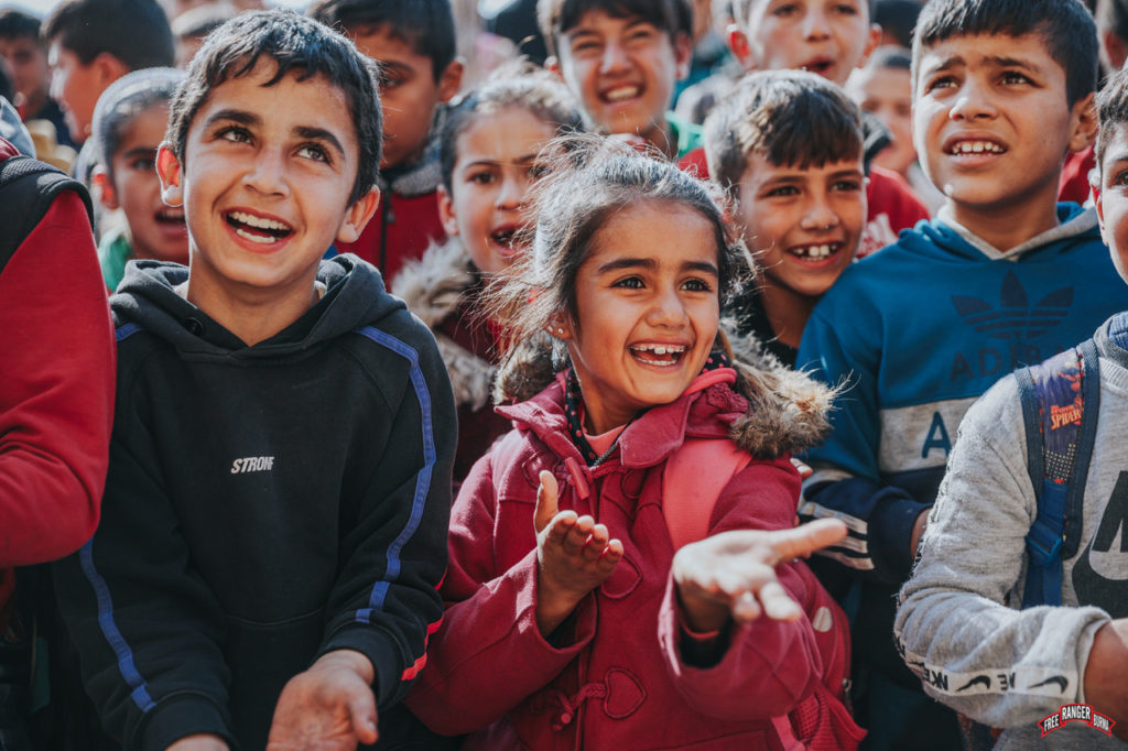 Children dance and sing at GLC at Baghouz school.
