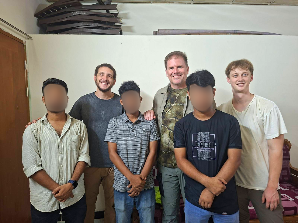Rangers with displaced Rohingya after a series of interviews.