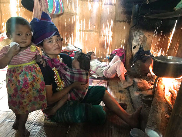 Naw Paw Tha, widow of Saw O Moo, and three of her seven children.