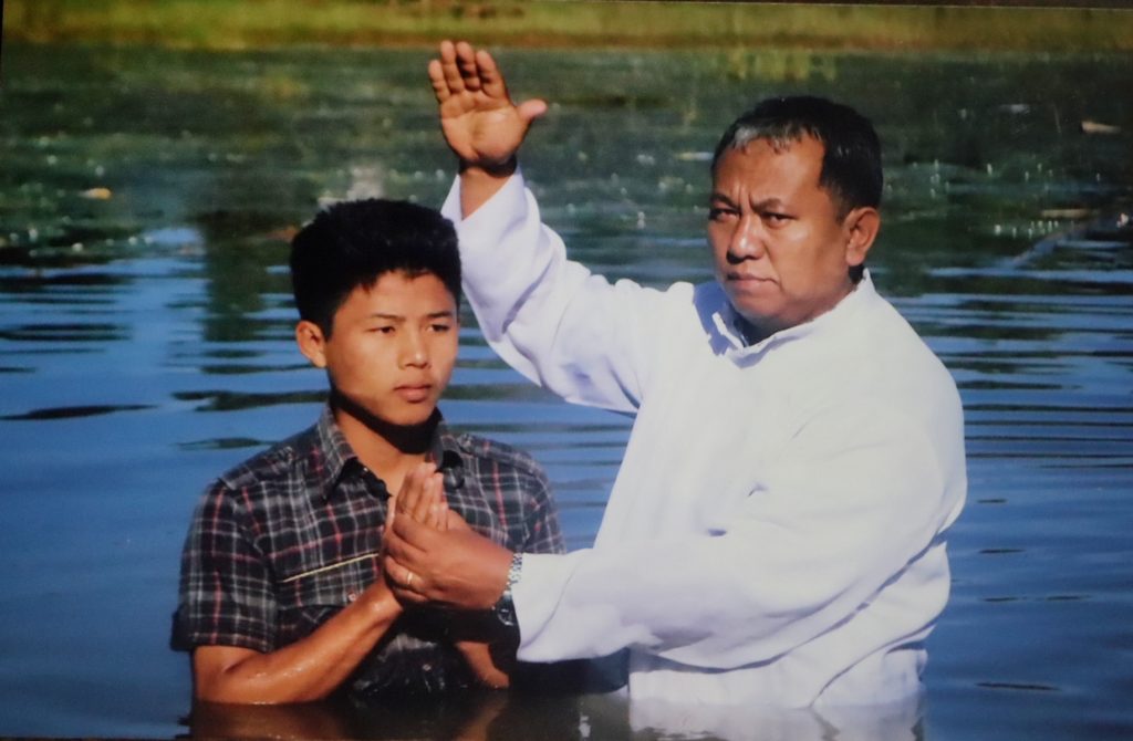 Hsi Hsi being baptized.